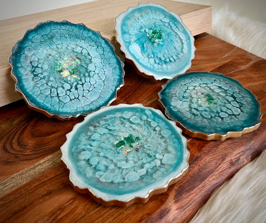 Sparkly turquoise-blue agate-shaped resin coasters