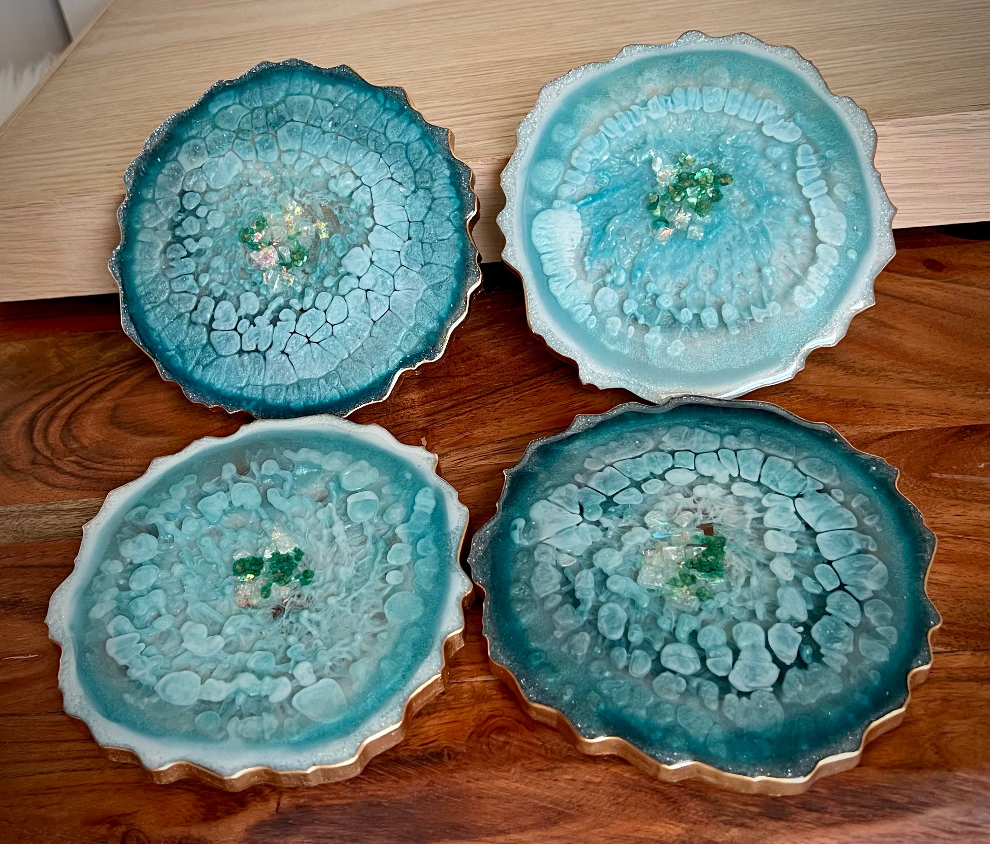 Sparkly turquoise-blue agate-shaped resin coasters 