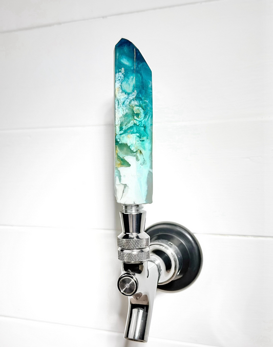 Handmade turquoise, teal, white, and gold resin beer tap handle in a crystal shape